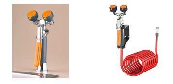 Two views of an emergency eyewash station with orange caps and a coiled red hose.