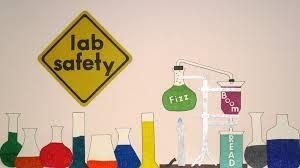 Lab with test tubes and Lab Safety Sign